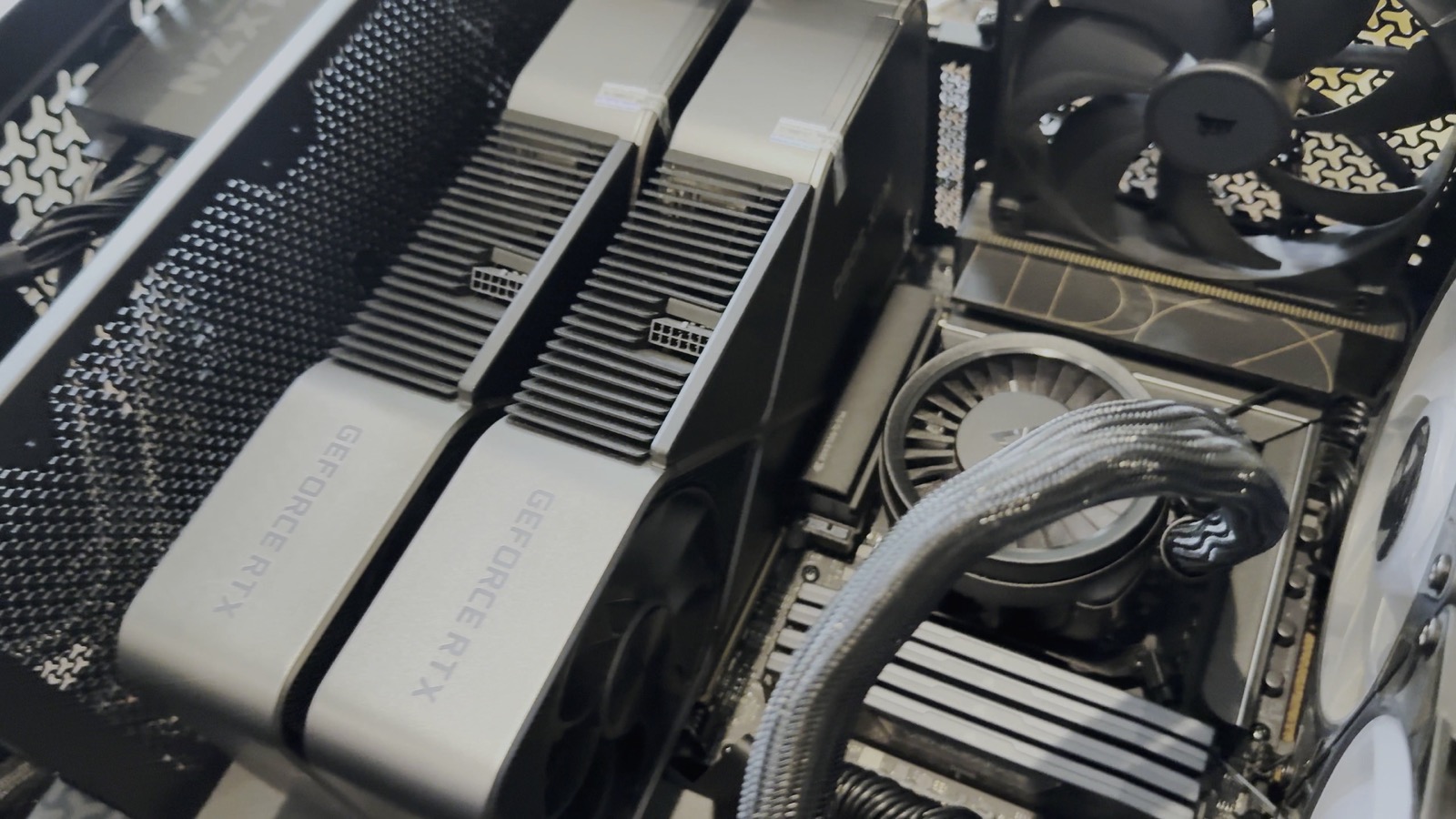 Two GeForce RTX graphics cards fitted side by side in a dual-GPU machine