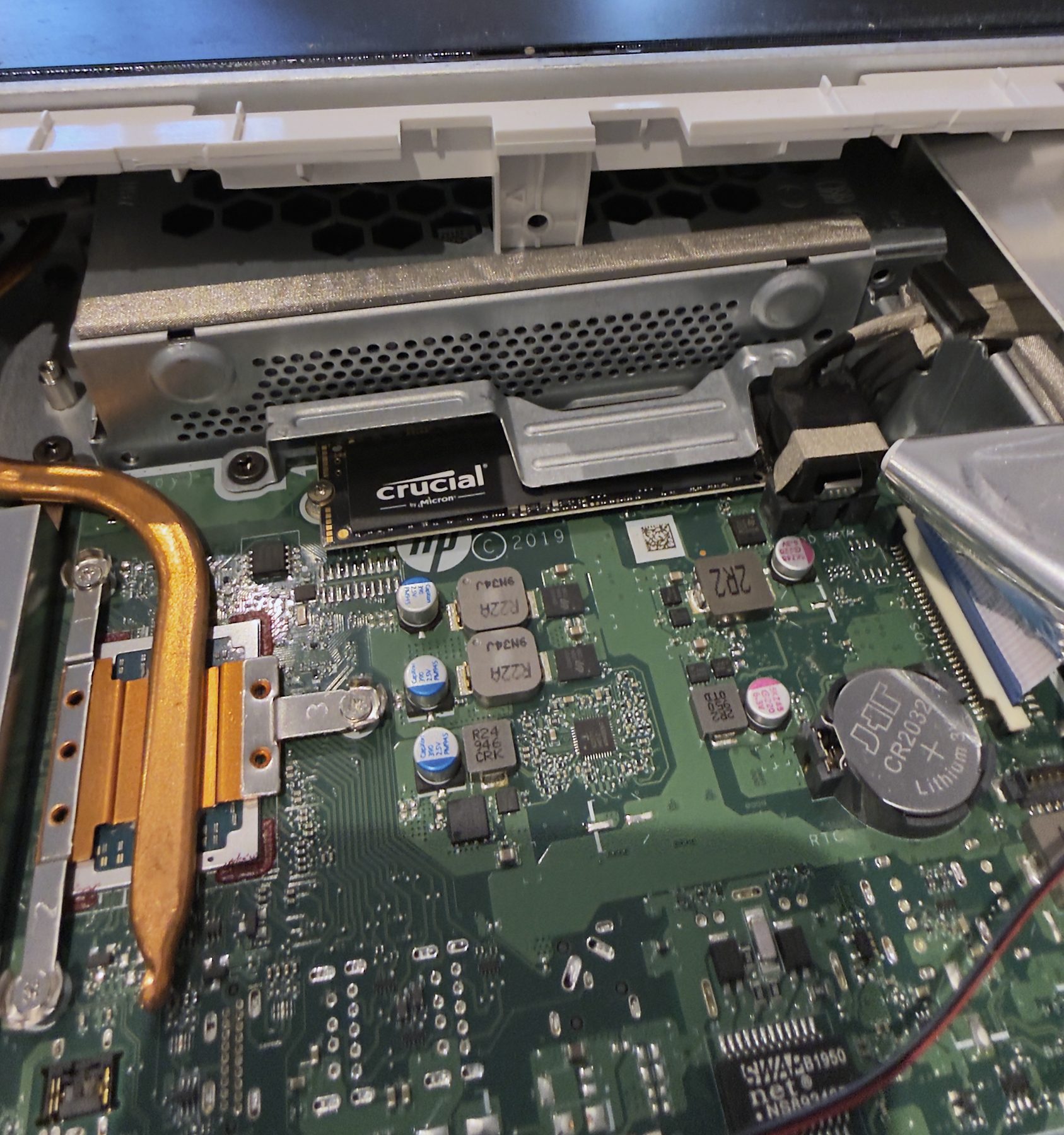 A Crucial SSD fitted inside an all-in-one PC
